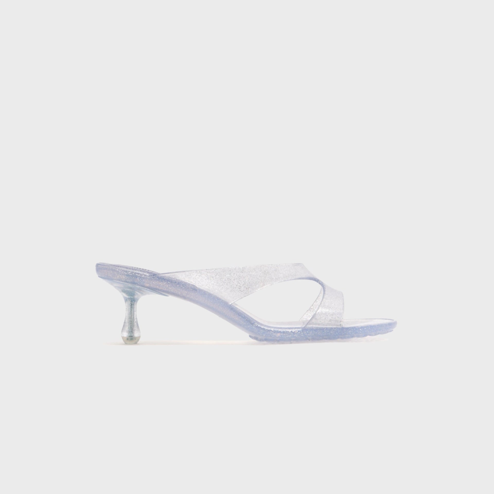Jimmy Choo Jelly Drop 50 mule sandal in glitter silver translucent jelly with kitten heel, lateral view