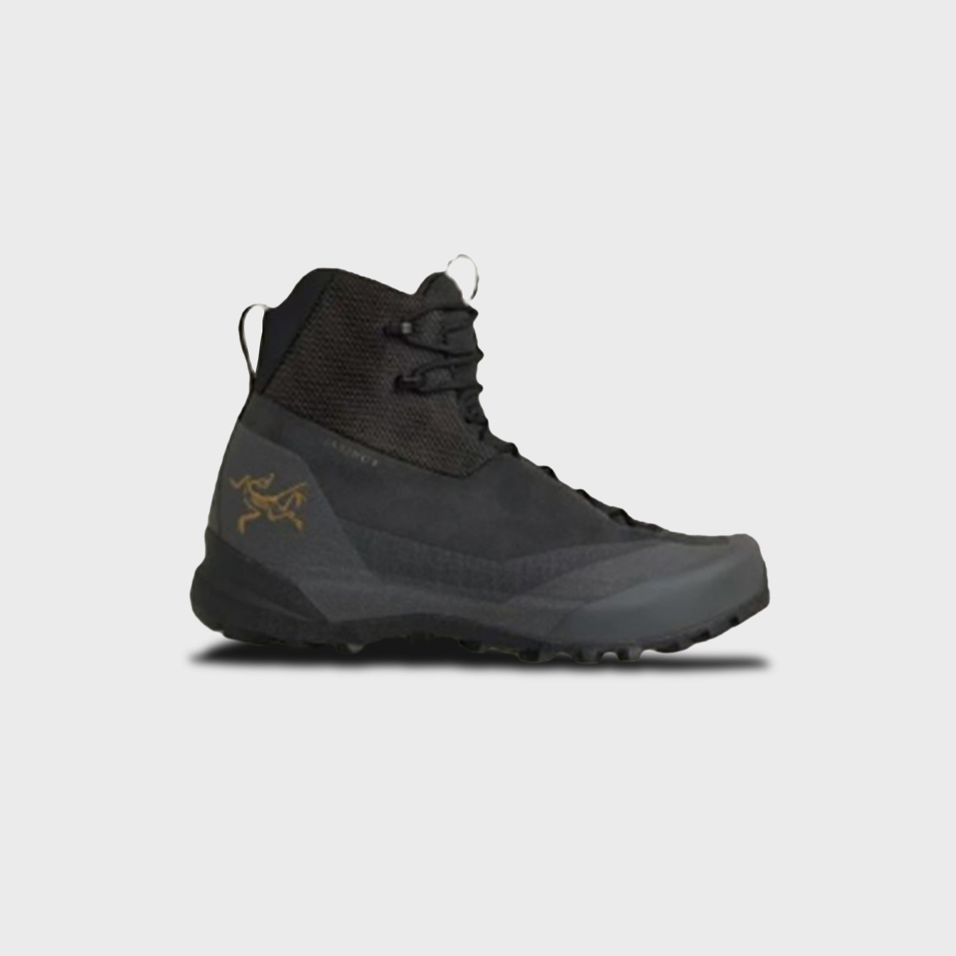 Arc'teryx Konseal Trek mid boot in black with graphite sole and gold bird logo, lateral side view