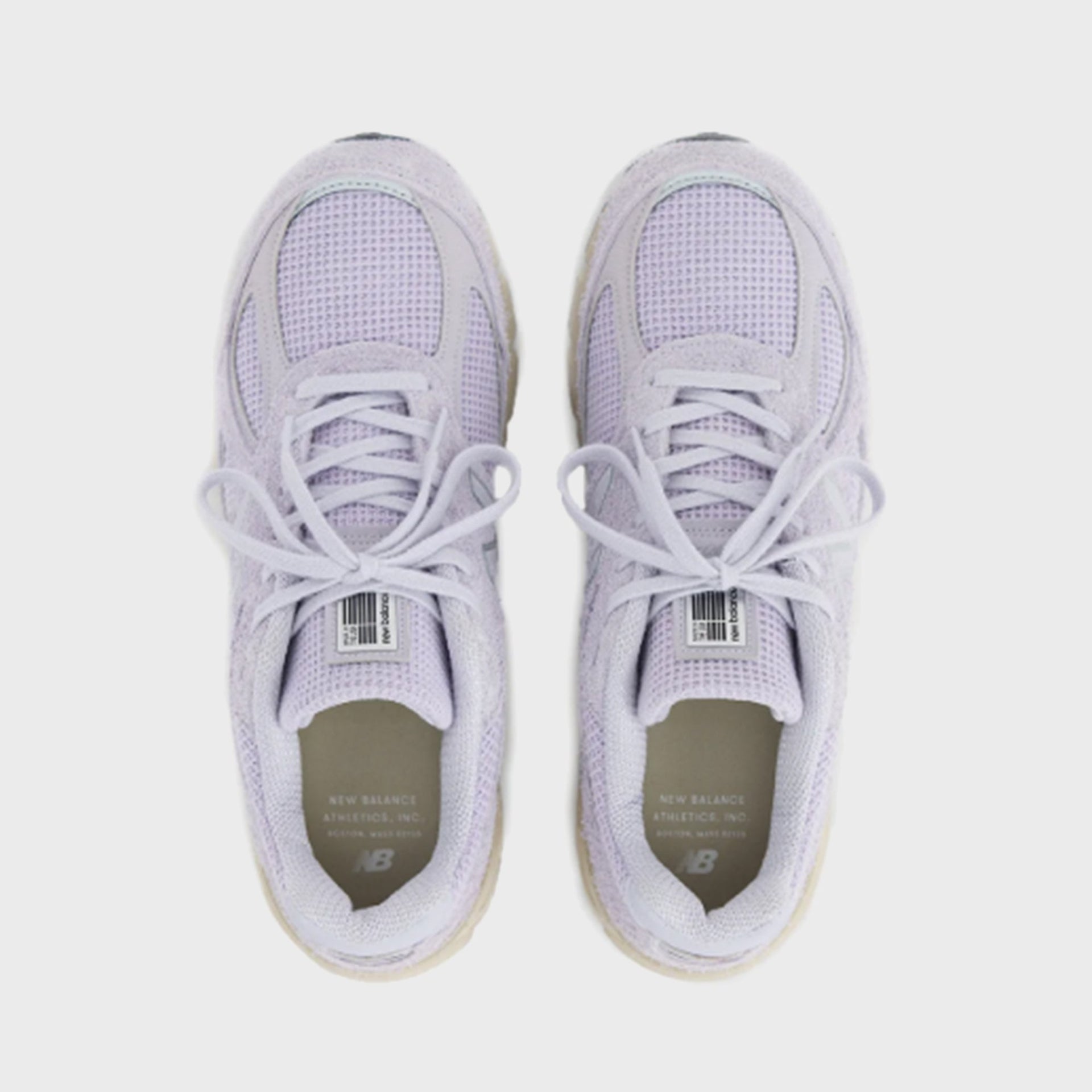 New Balance 990v4 Made in USA sneaker in lavender suede and mesh, top-down view of pair