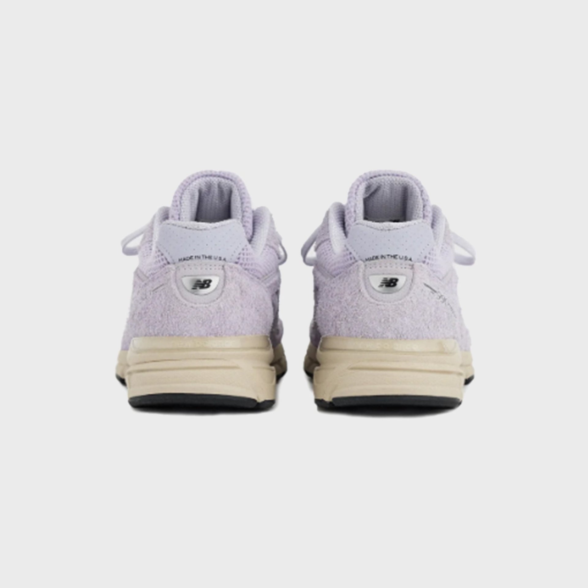New Balance 990v4 Made in USA sneaker in lavender suede, rear heel view of pair