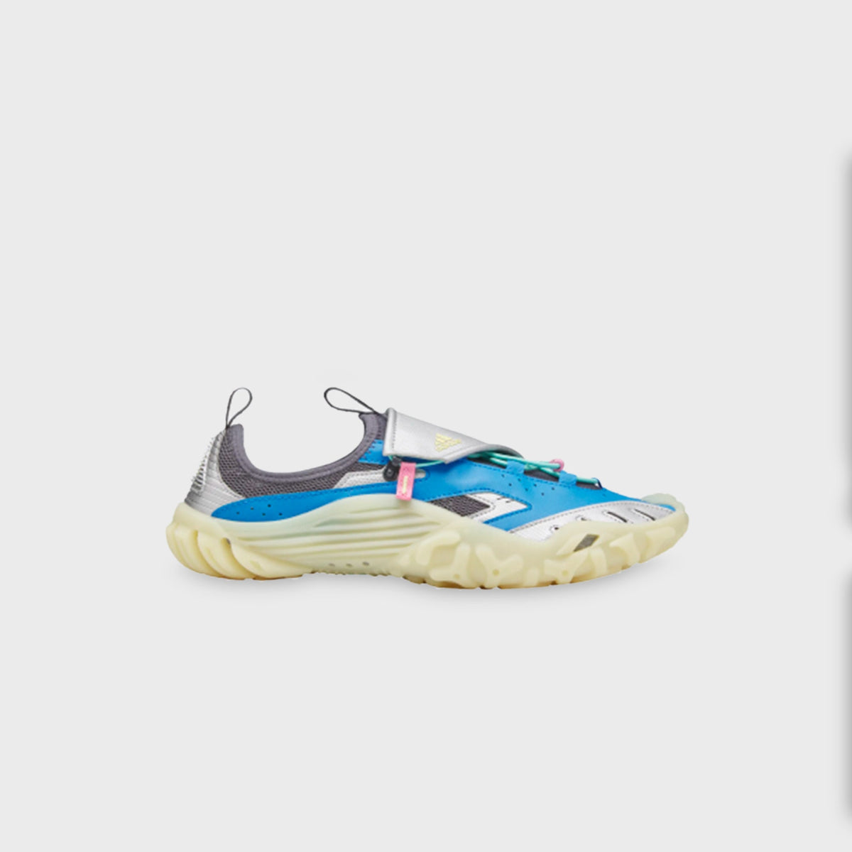 adidas x Pharrell Williams Water Moc in Lucid Ray Blue and Silver Metallic, side profile showing molded translucent outsole and bungee lace closure