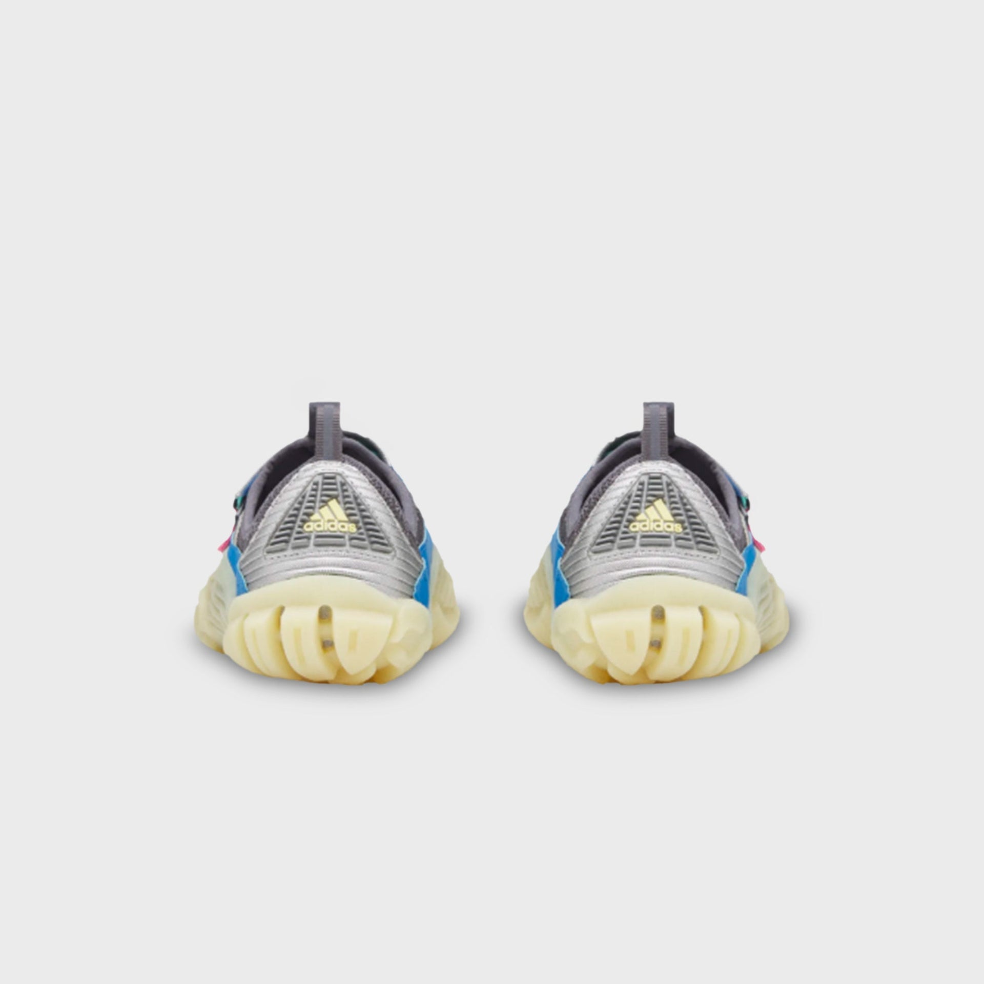 adidas x Pharrell Williams Water Moc pair, rear heel view showing translucent Aurora Onix outsole and pull-tab heel loops