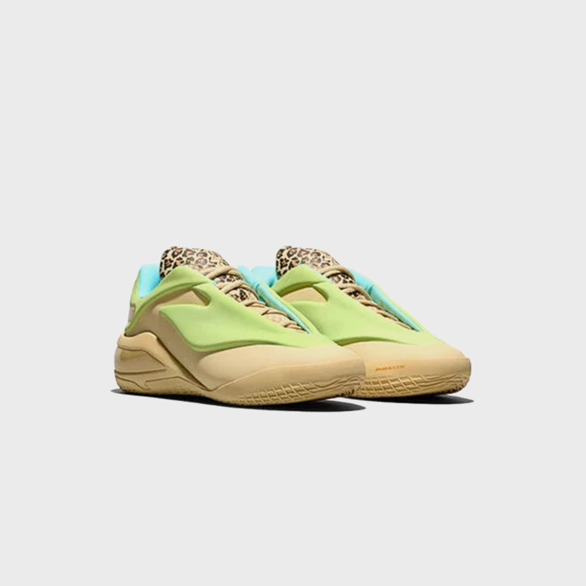 Converse SHAI 001 basketball sneaker in tan with lime green overlay, front three-quarter view of pair