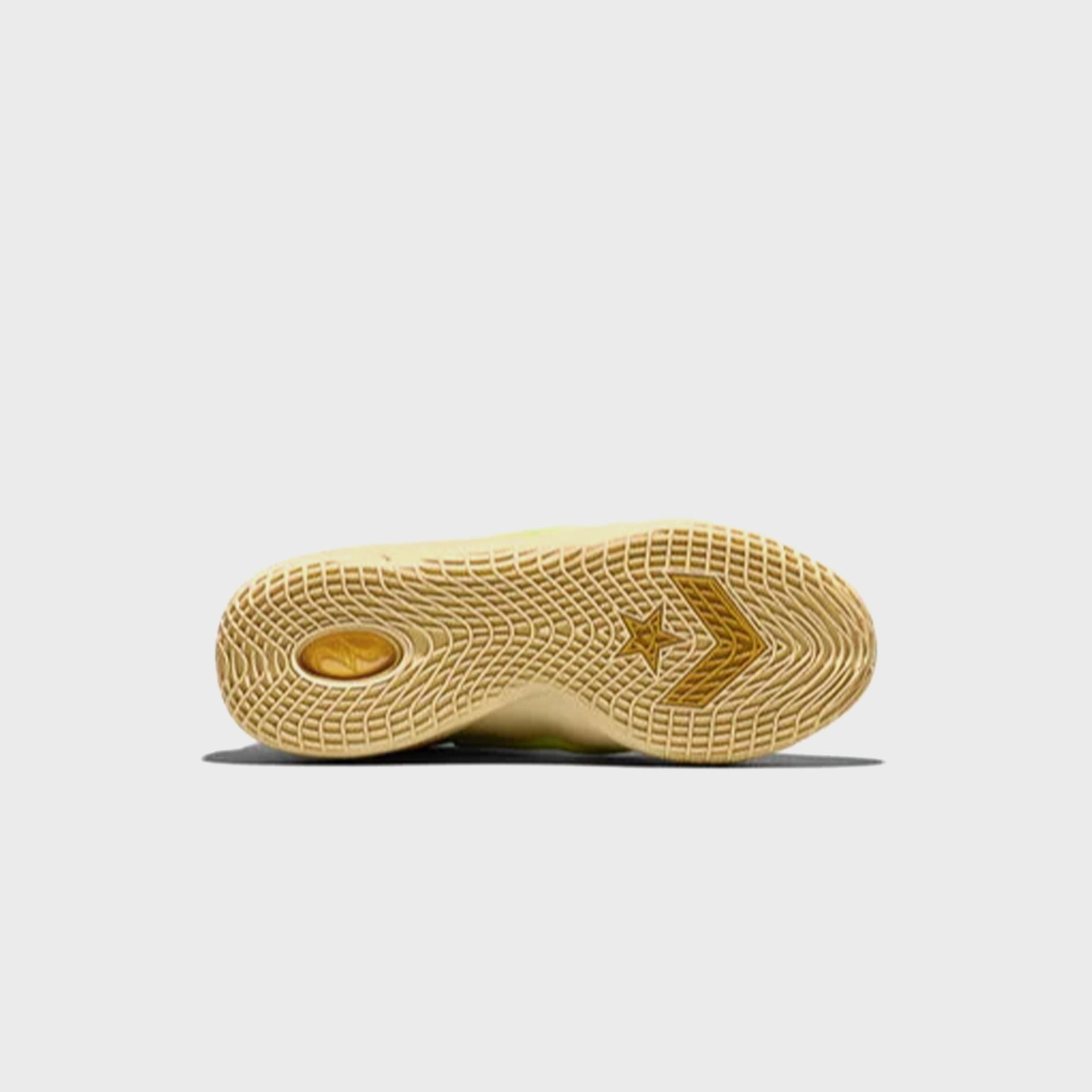 Converse SHAI 001 basketball sneaker outsole showing gold star and chevron logo
