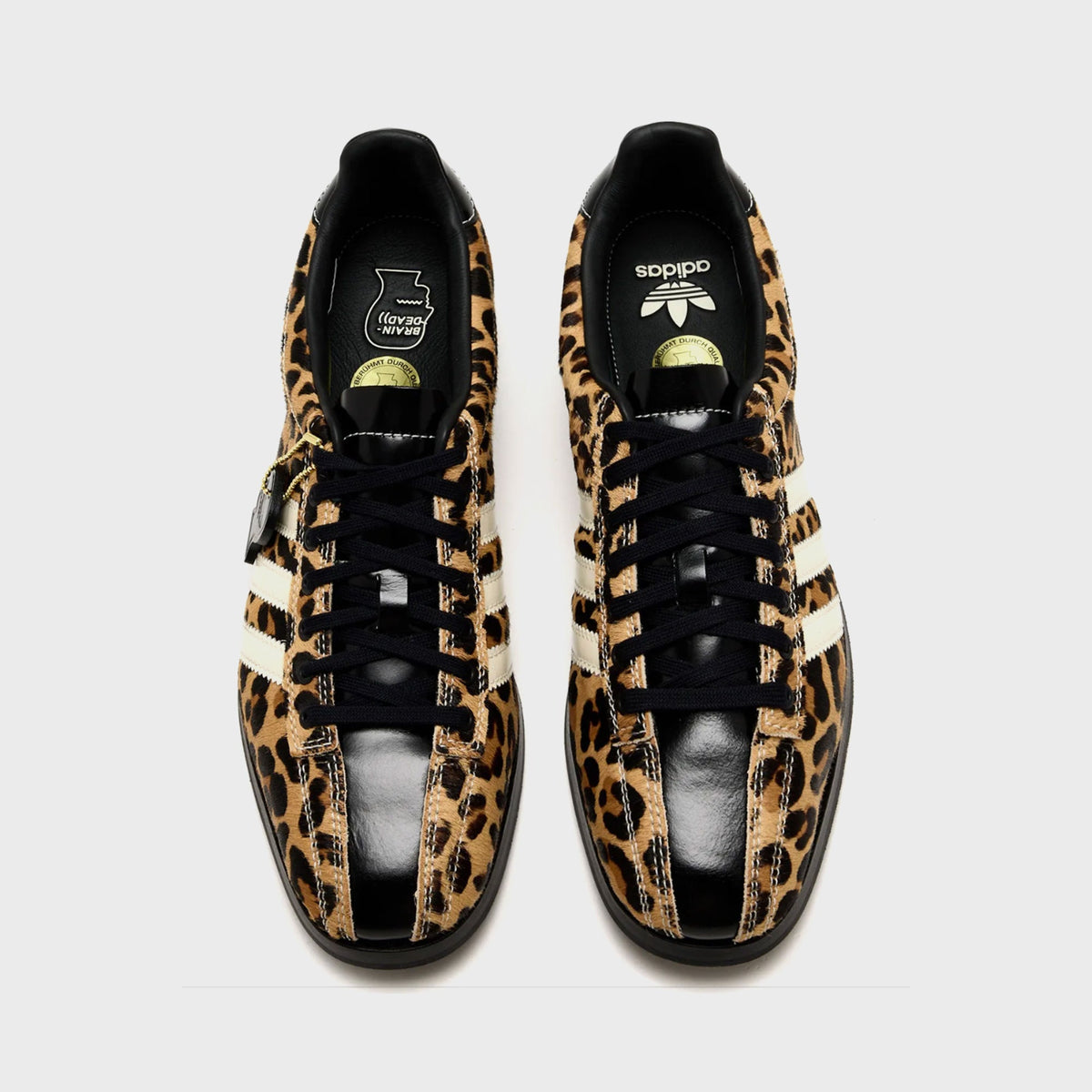 adidas x Brain Dead Samba Bowling shoe in Tan / Black / Cream leopard-print pony hair, top-down view of pair with black leather toe cap and black laces