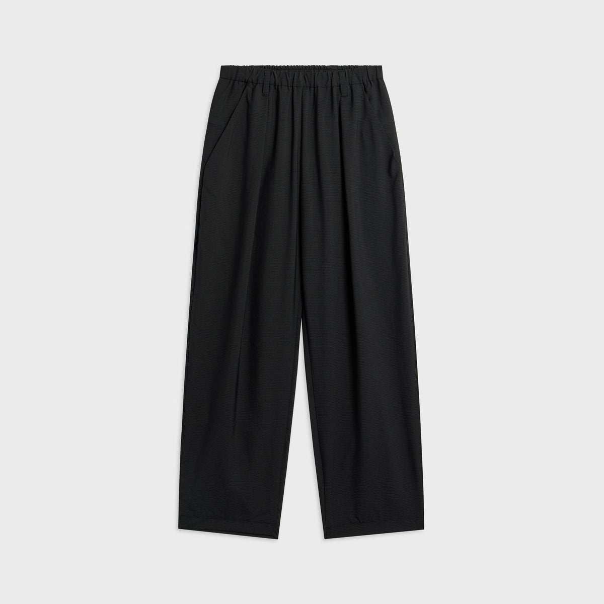 Teatora Wallet Resort Pant in grid black, front view of wide-leg trousers with elastic waistband and side pockets