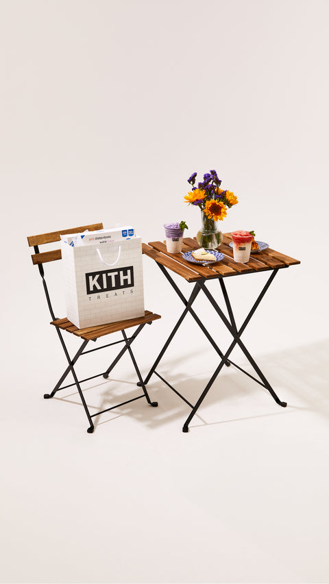 
        Two Treats Chillers desserts sitting on a table next to a Kith Treats shopping bag.
      
