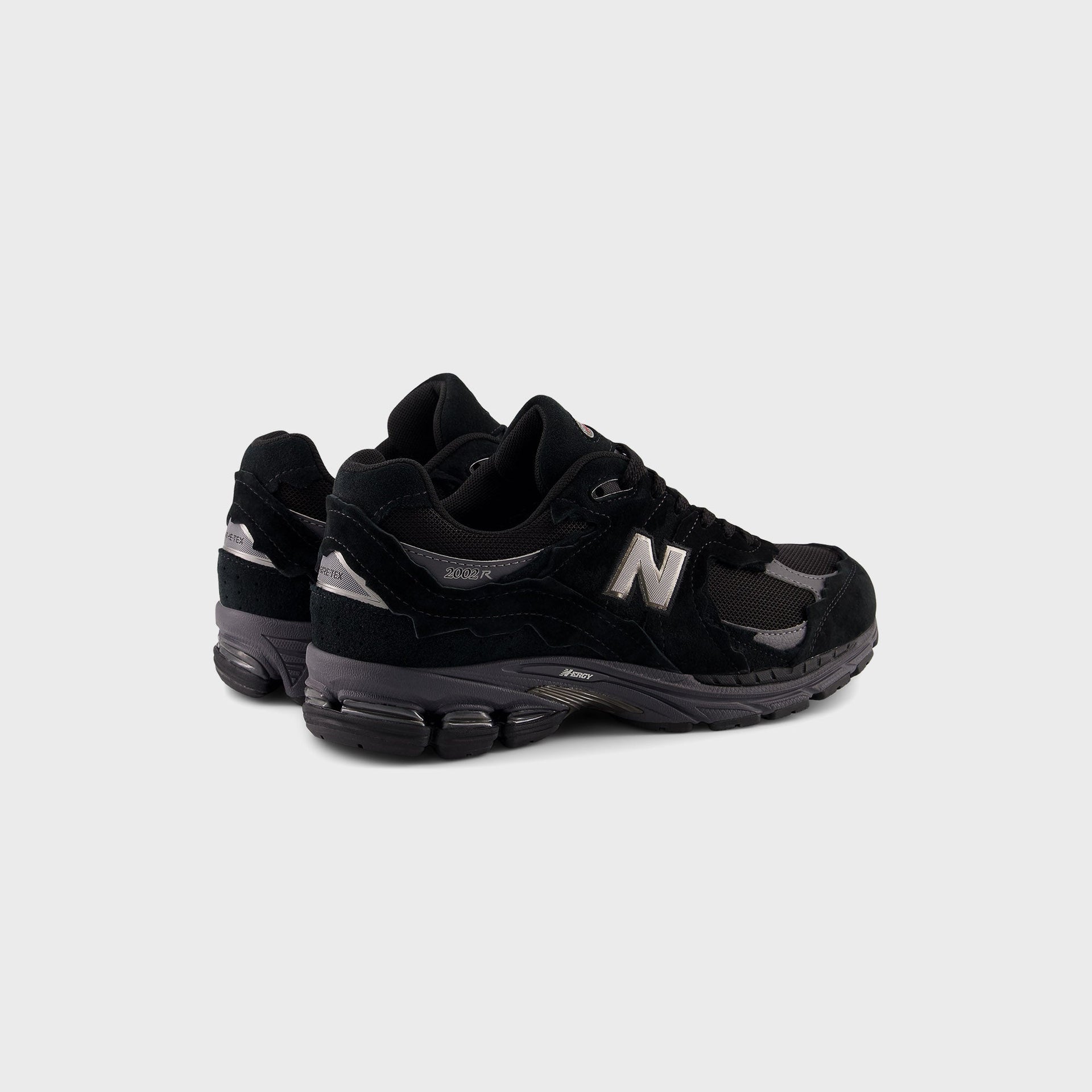 New Balance U2002DX - Black / Magnet