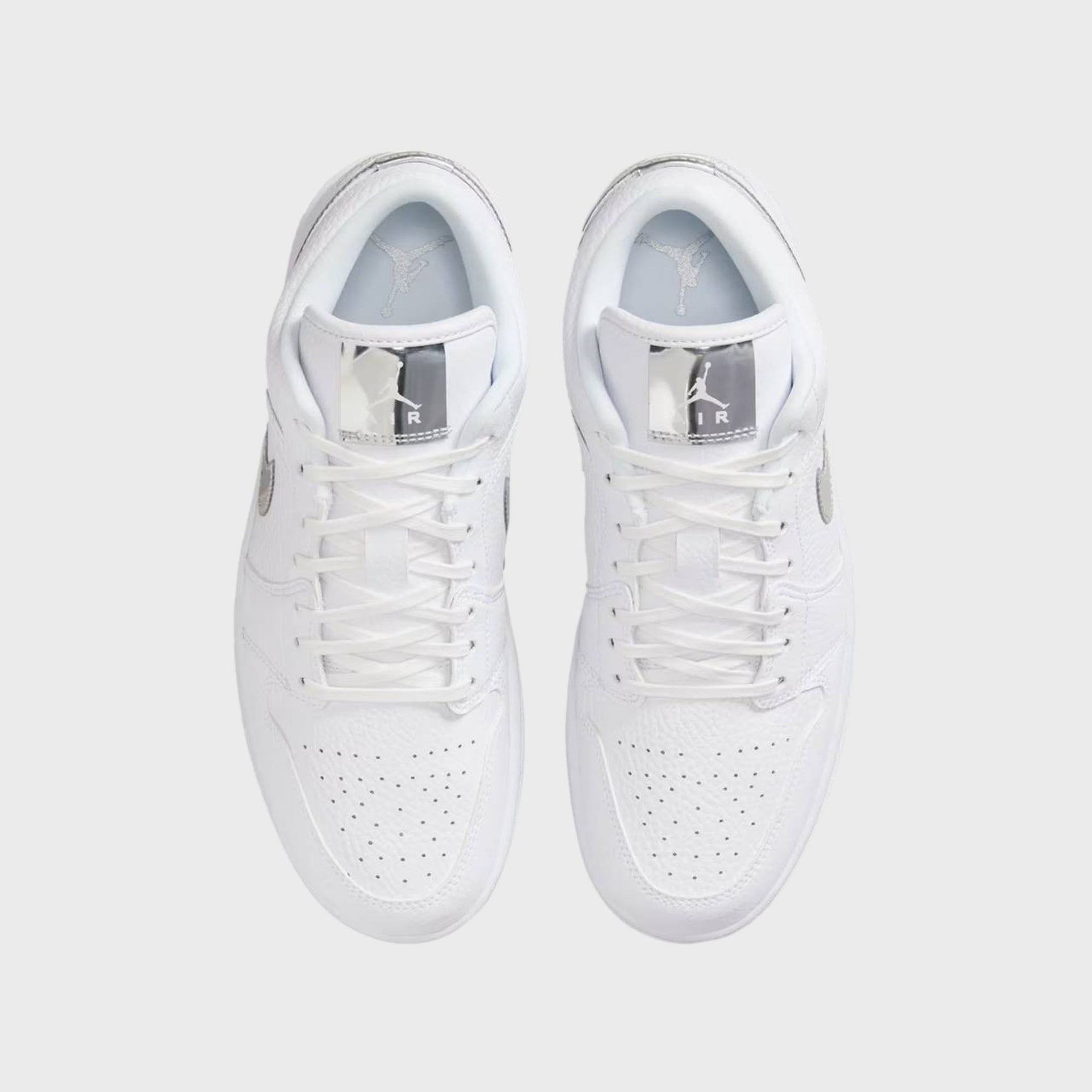 Jordan WMNS Air Jordan 1 Low SE - White / Metallic Silver