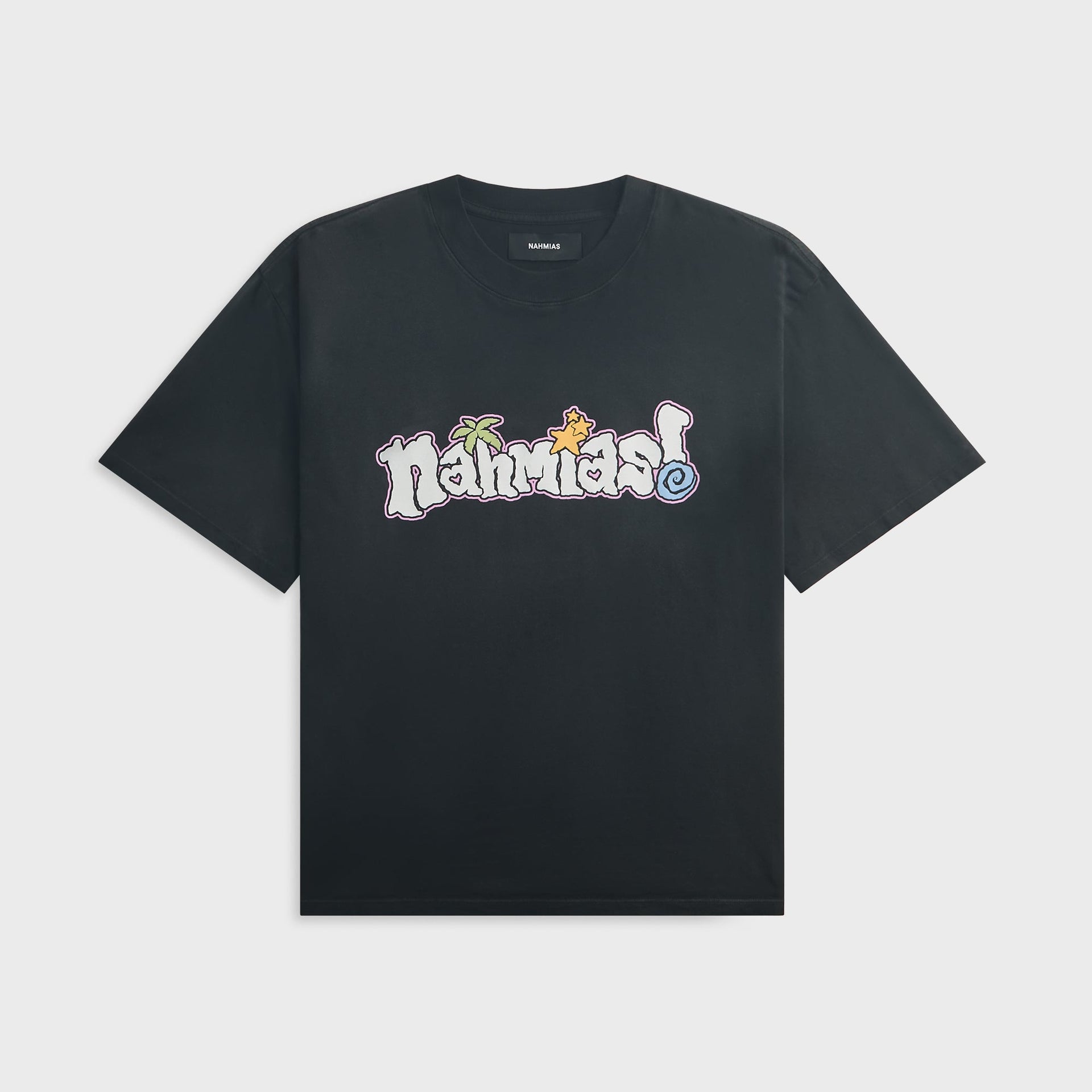 NAHMIAS Boardwalk boxy tee in aged black with a pink-outlined nahmias! bubble graphic of a palm tree, stars and blue swirl, front
