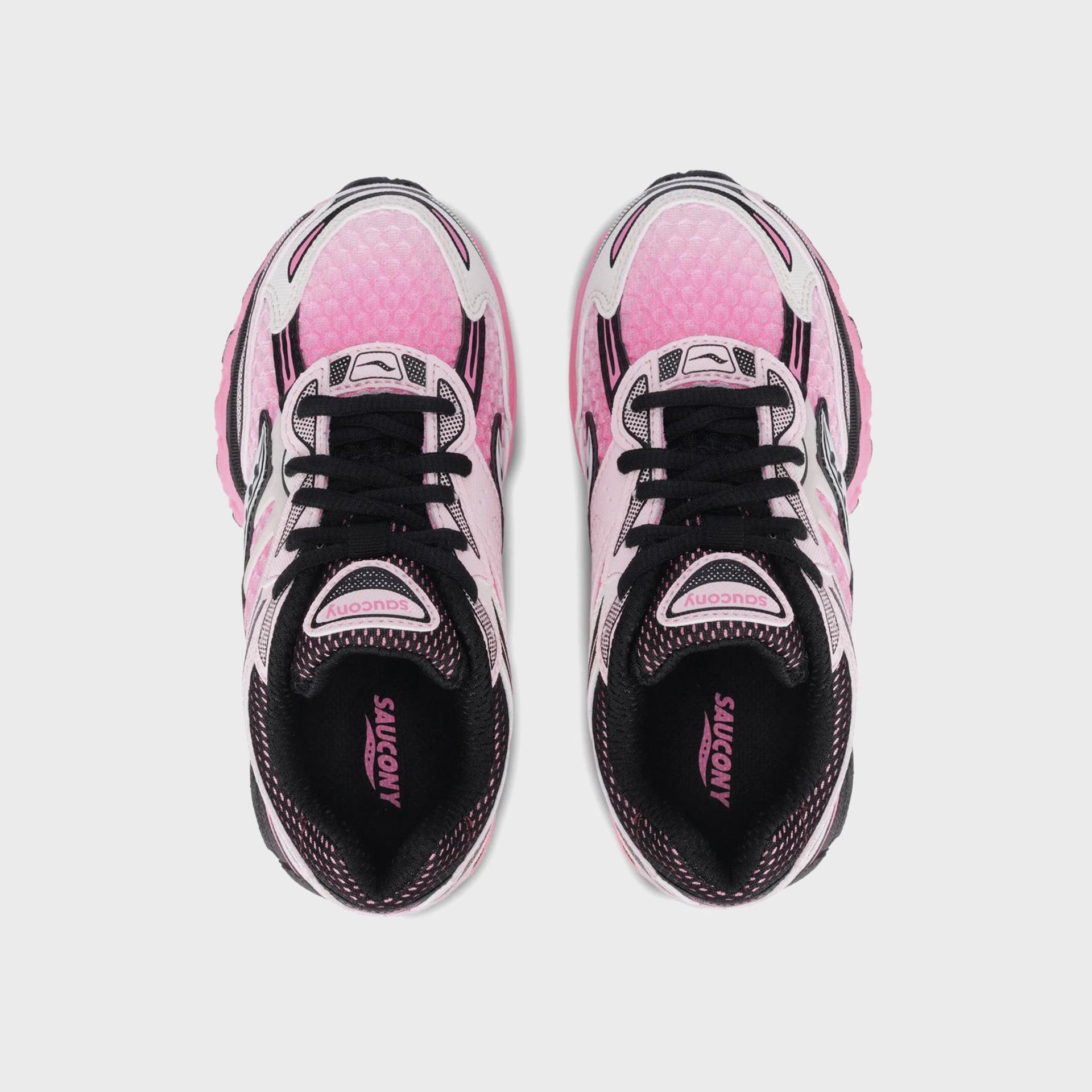 Saucony GS Omni 9 KDZ sneakers, top-down view showing pink mesh uppers and black laces