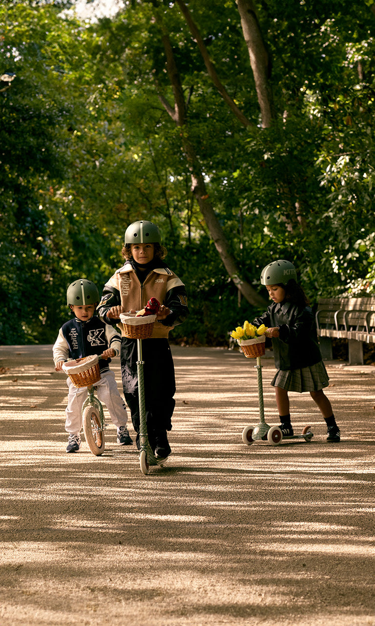 
        Kith Kids for Banwood scooters, a bike, and helmet
      
