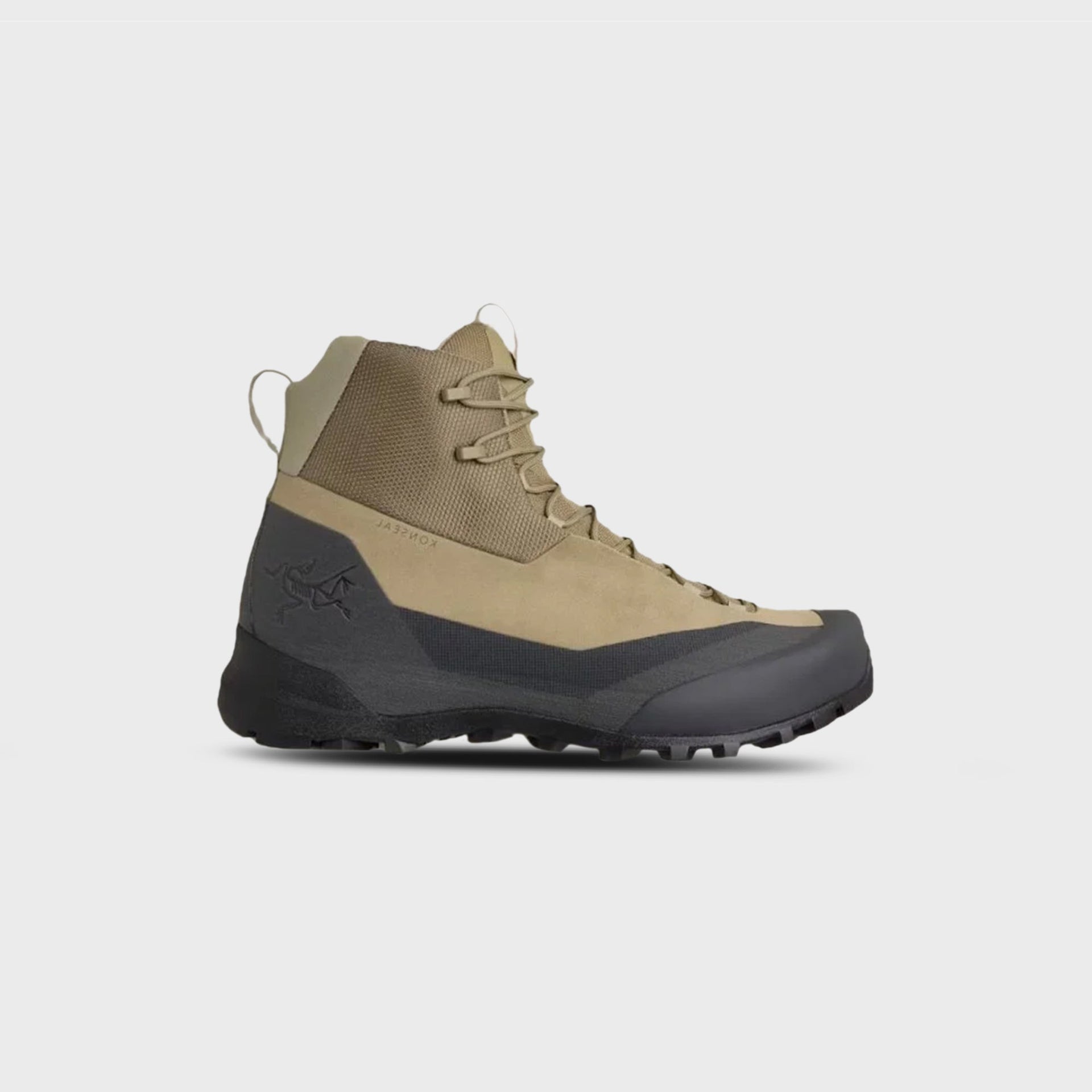 Arc'teryx Konseal Trek mid boot in bracken tan with graphite black toe rand, lateral side view