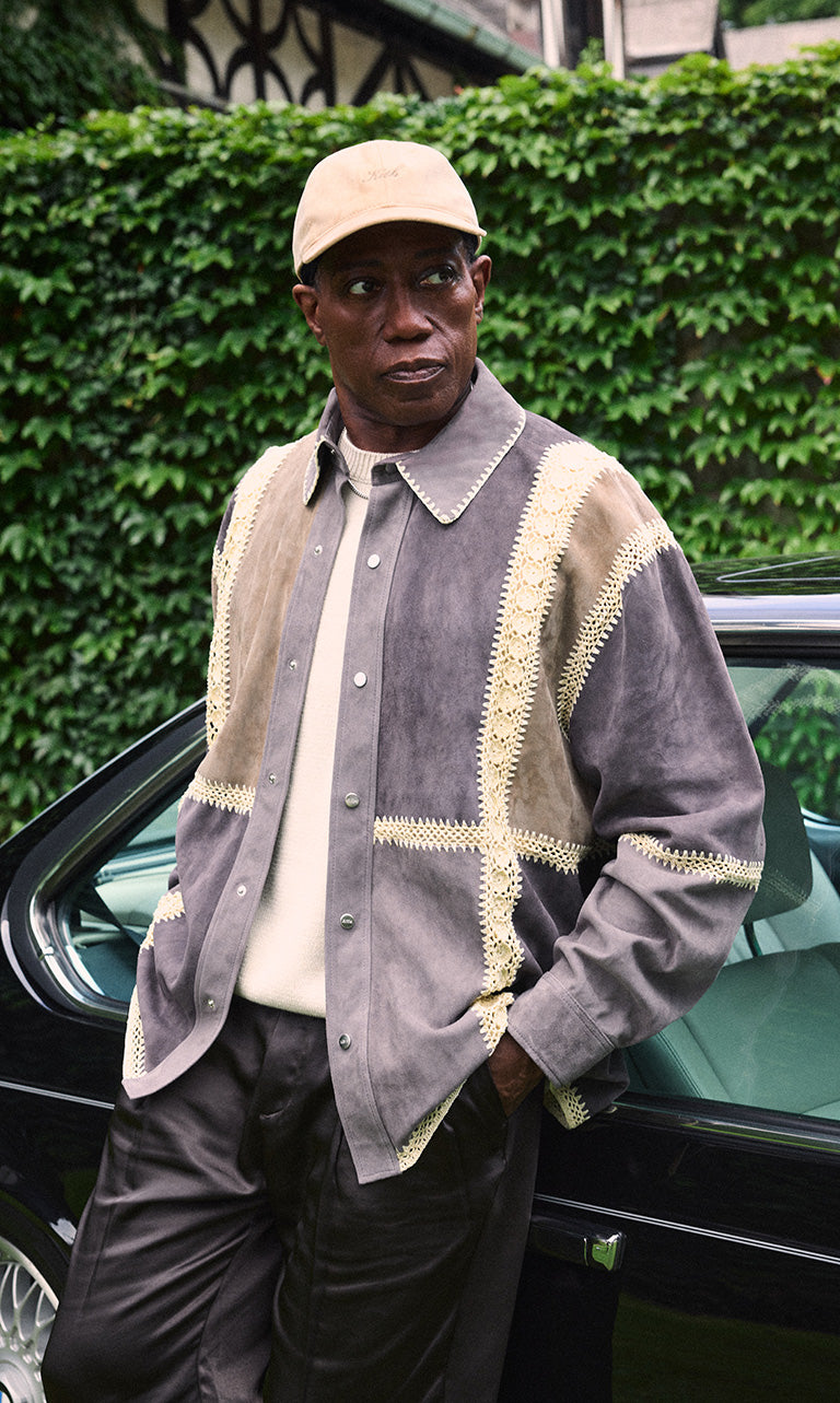 
        Wesley Snipes for Ronnie Fieg for UrlfreezeShops & Giorgio Armani: The Entrepreneur wearing a jacket, hat, sweater, and pants.
      
