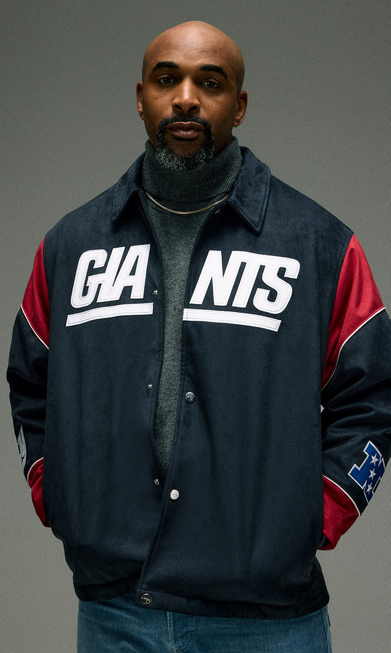 
        David Tyree wearing a Kith for the NFL 2024 jacket. 
      
