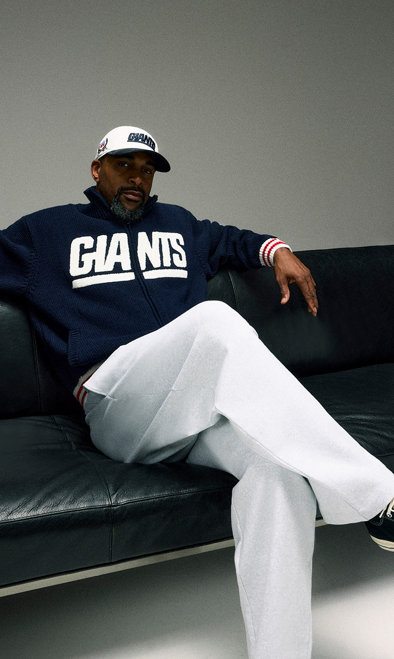 
        David Tyree wearing men's clothes from Kith for the NFL 2024.
      
