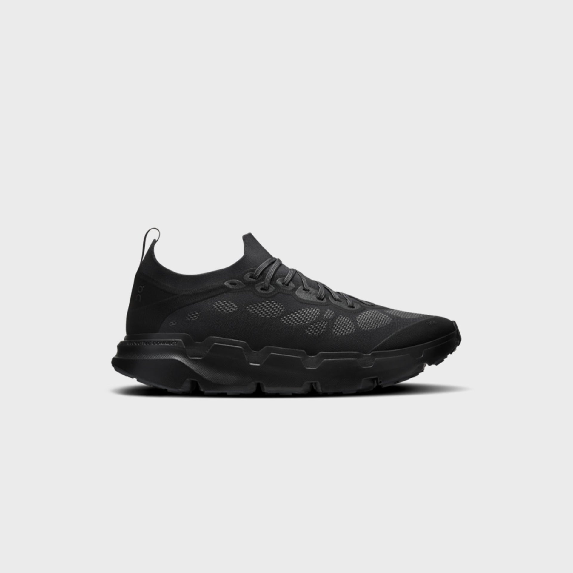On x Post Archive Faction Cloudsoma sneaker in all-black, side profile view