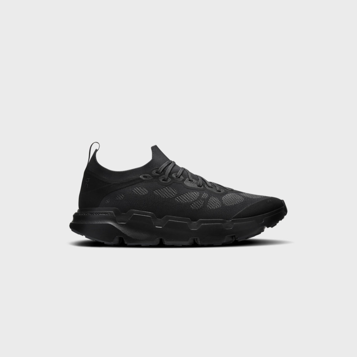 On x Post Archive Faction Cloudsoma sneaker in all-black, side profile view