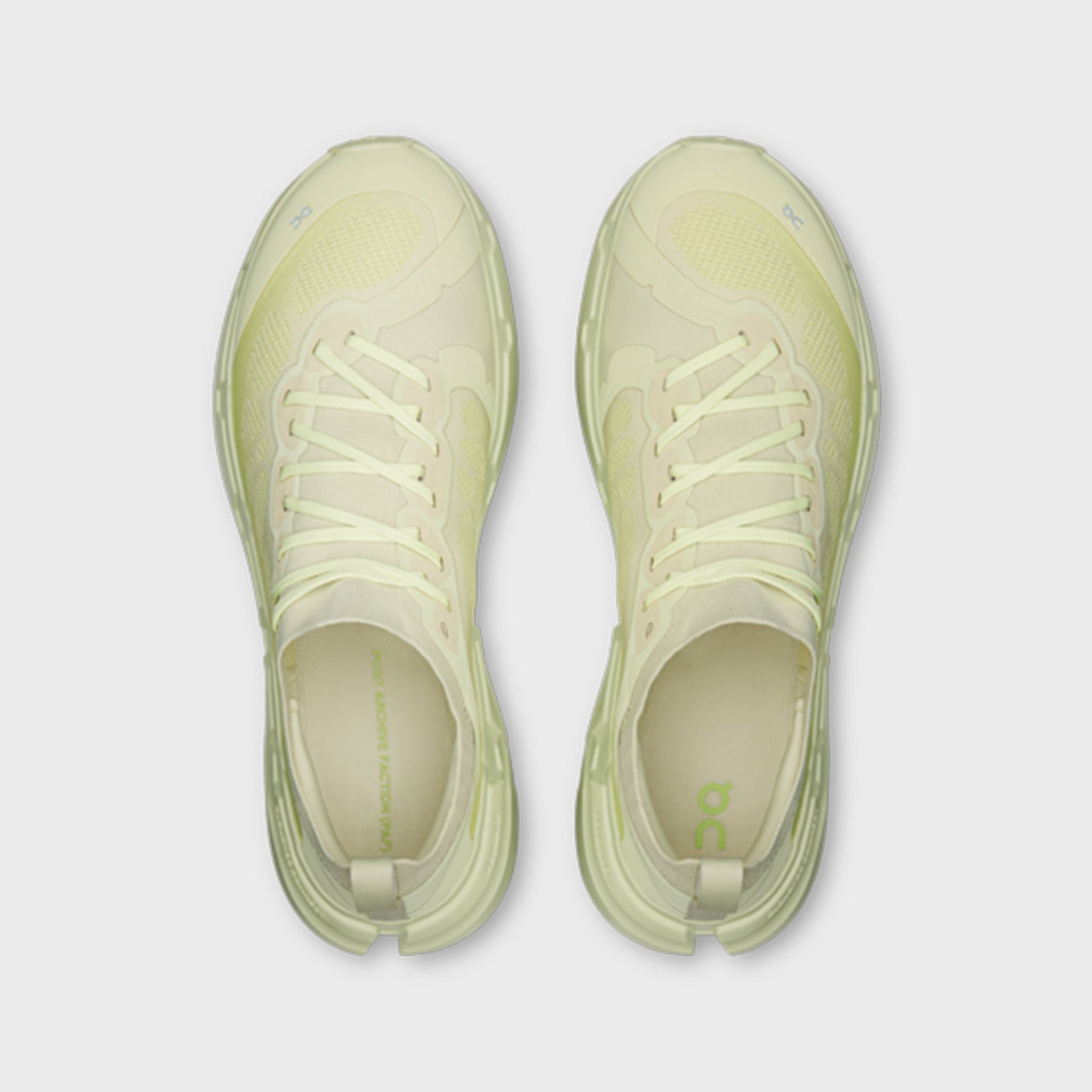 On x Post Archive Faction Cloudsoma sneaker in pale lime green, top-down view of pair