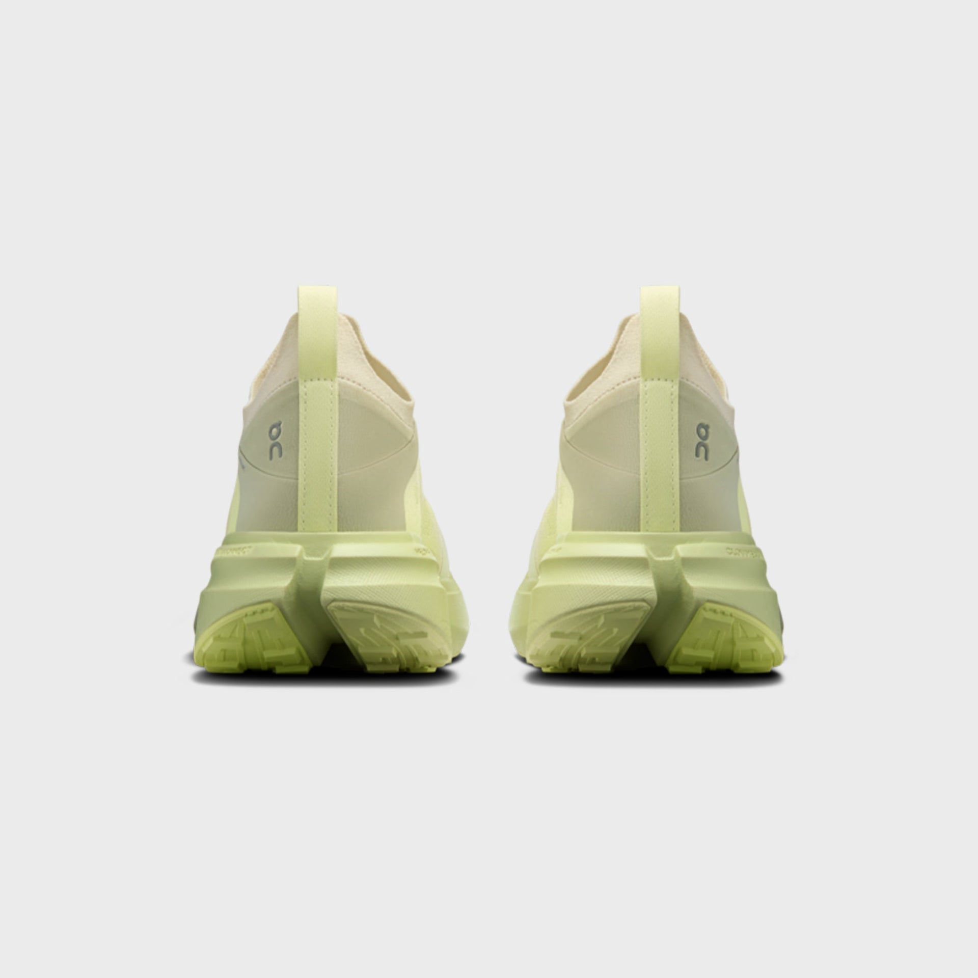On x Post Archive Faction Cloudsoma sneaker in pale lime green, rear heel view of pair