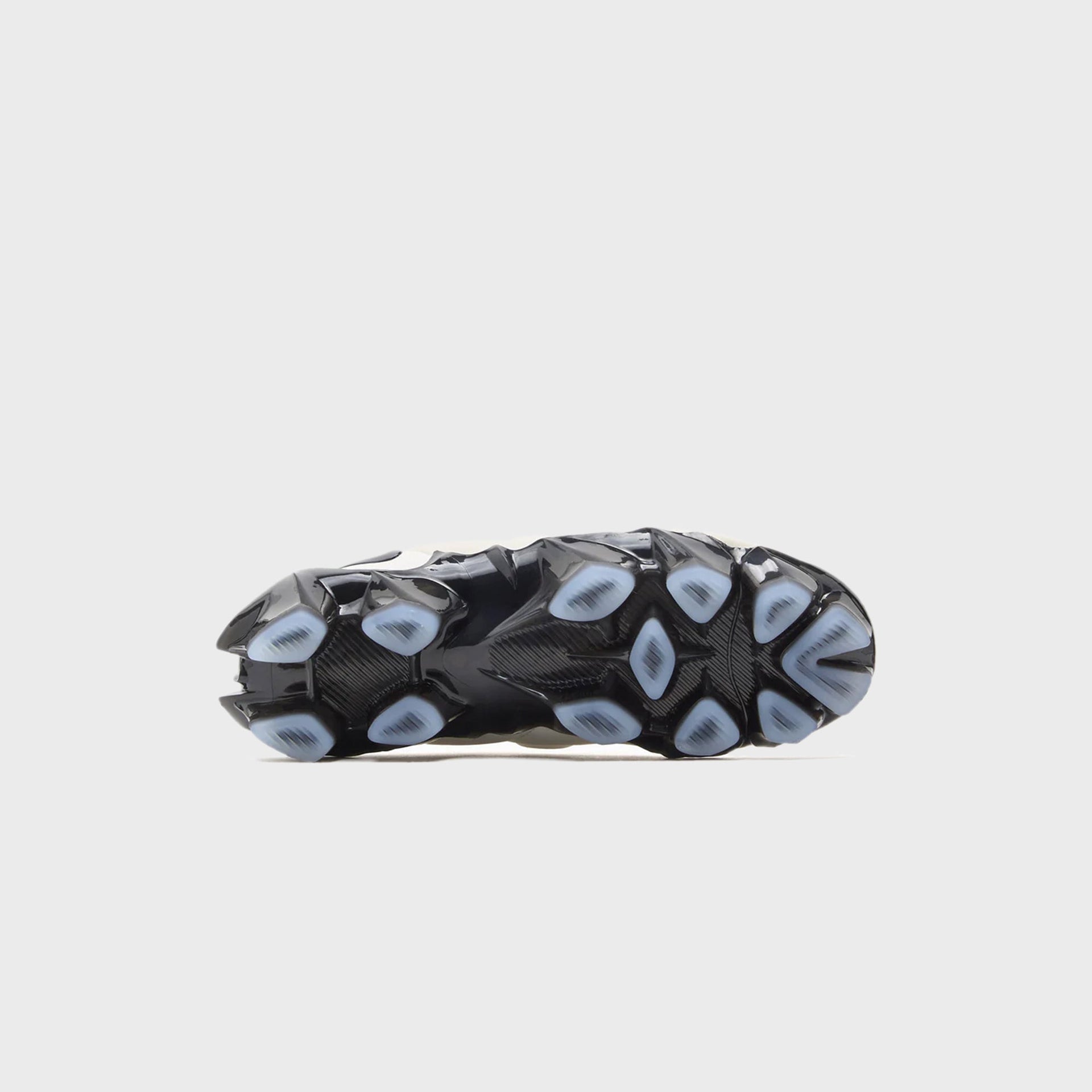 Outsole view of the Nike WMNS First Sight Mirage showing the black and icy-blue VaporMax air pods and traction pattern