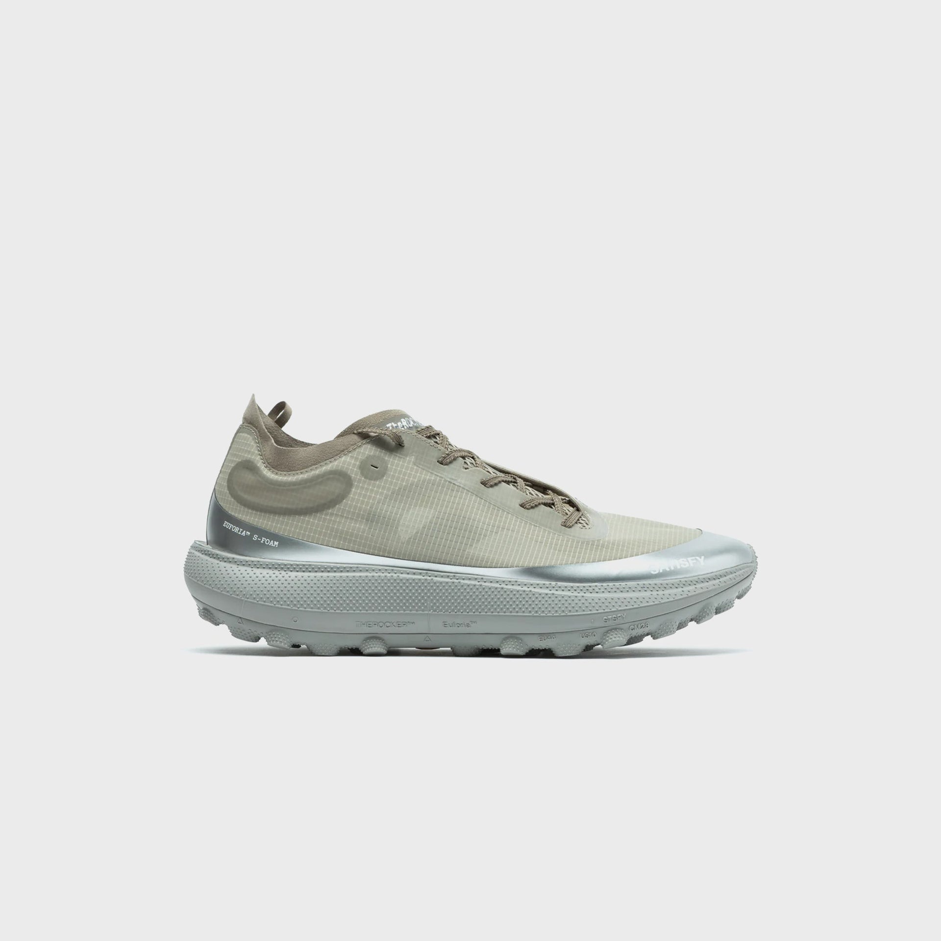 SATISFY TheROCKER sneaker in aluminum grey, lateral side view showing chunky ridged EUFORIA S-FOAM midsole and reflective silver toe cap
