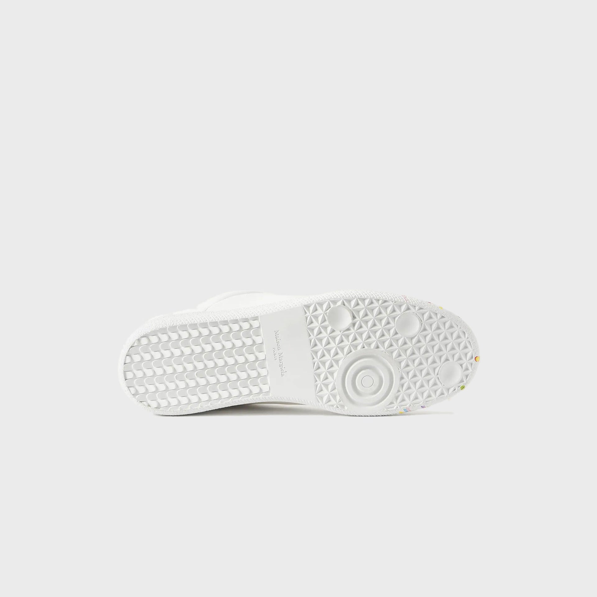 Maison Margiela Future low-top sneaker outsole showing white tread with Maison Margiela Paris branding