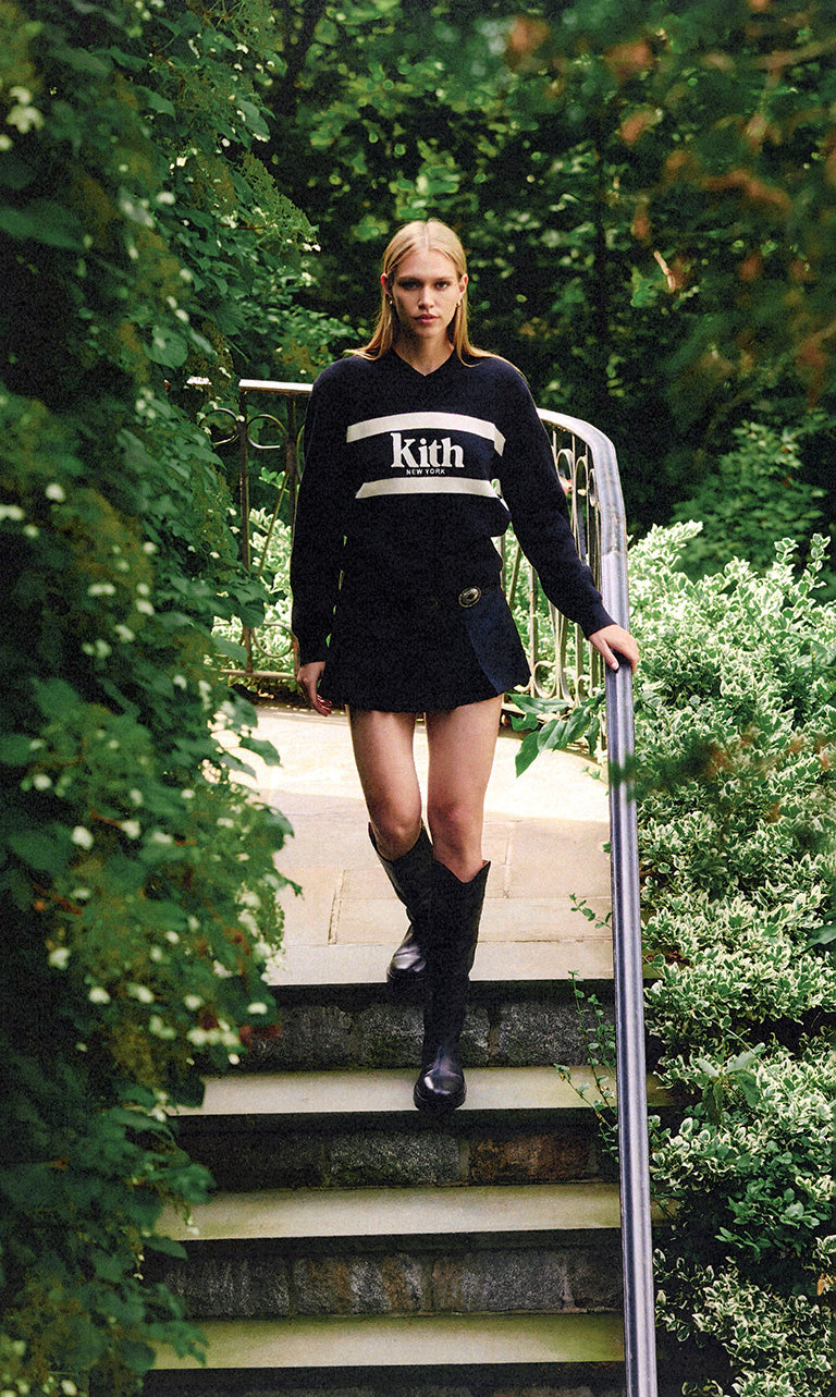 
        A model wearing a sweater and skirt from UrlfreezeShops for the New York Knicks - SLAM Magazine.
      
