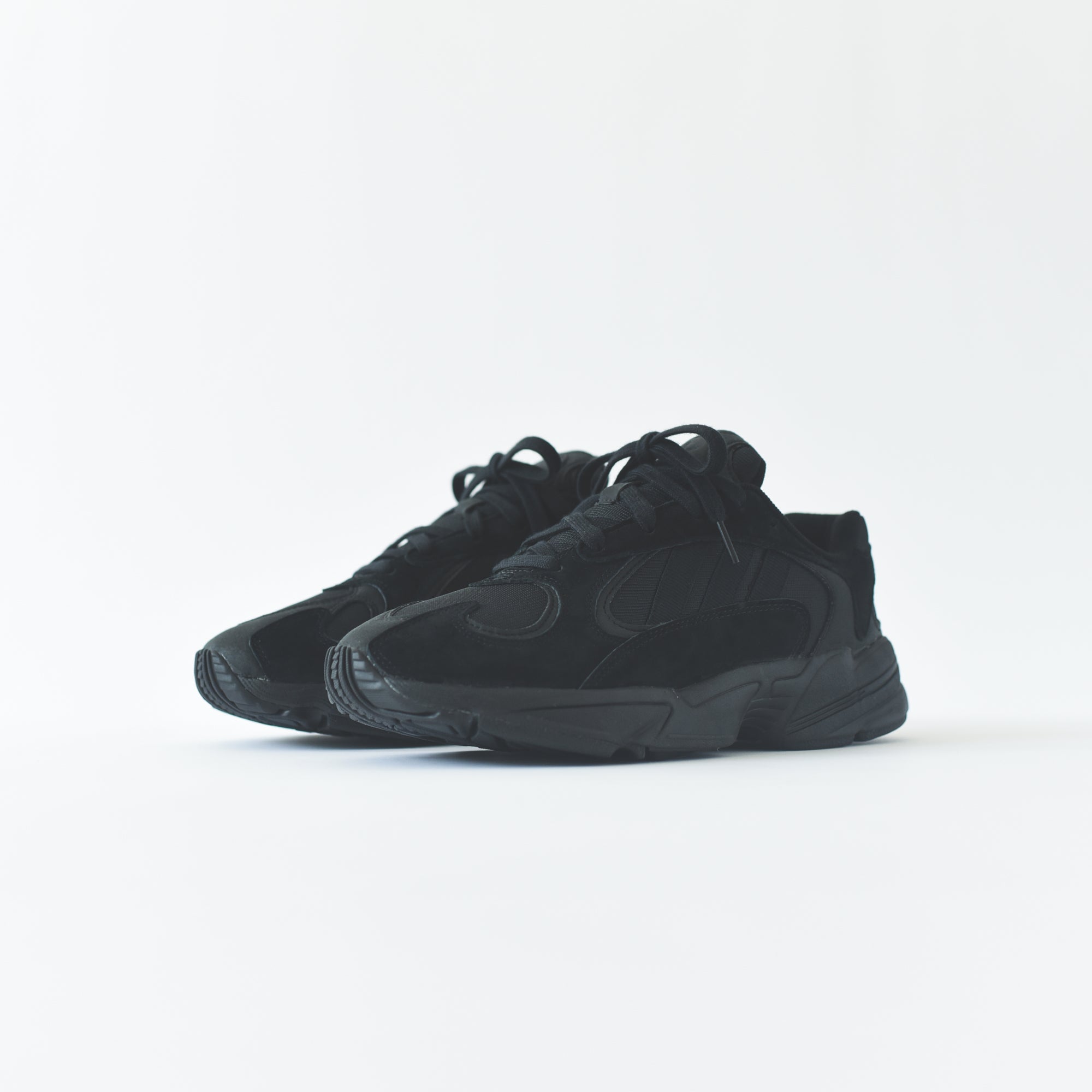 yung 1 triple black on feet