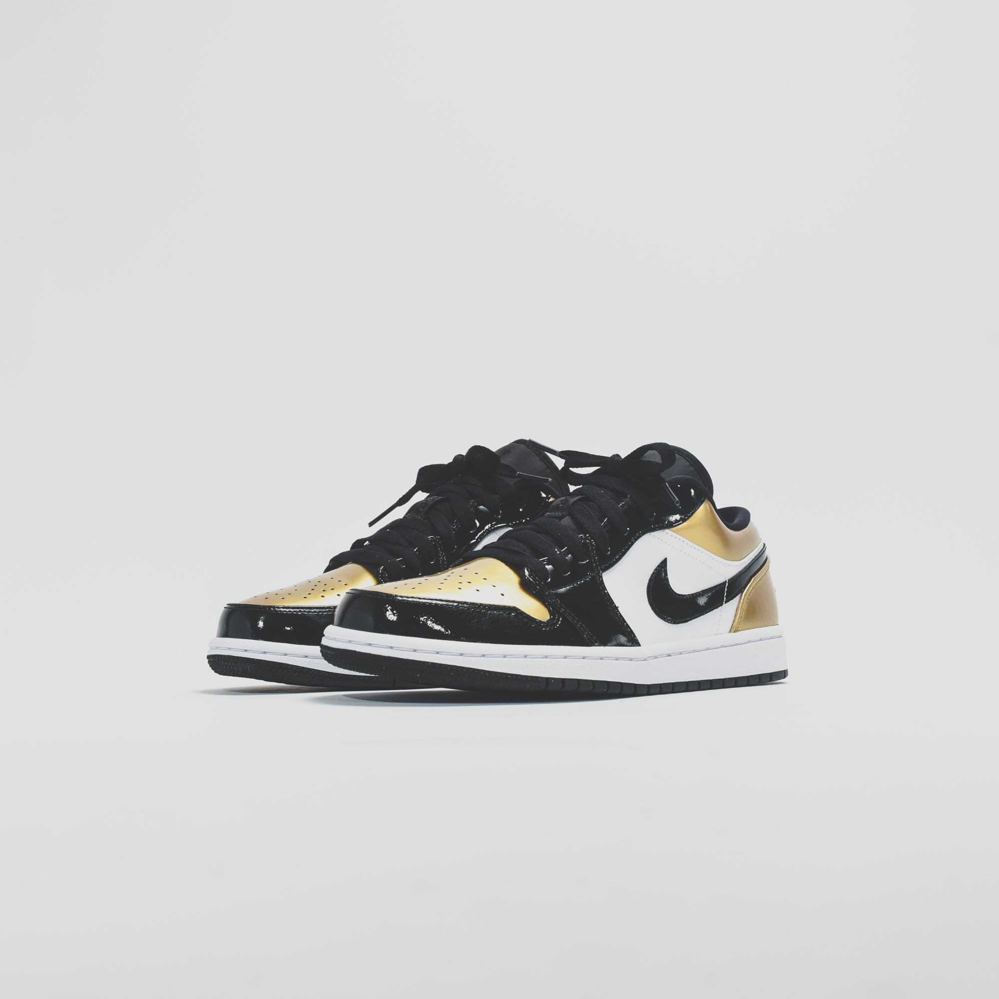 Nike Air Jordan 1 Low - Black / Gold Patent – Kith