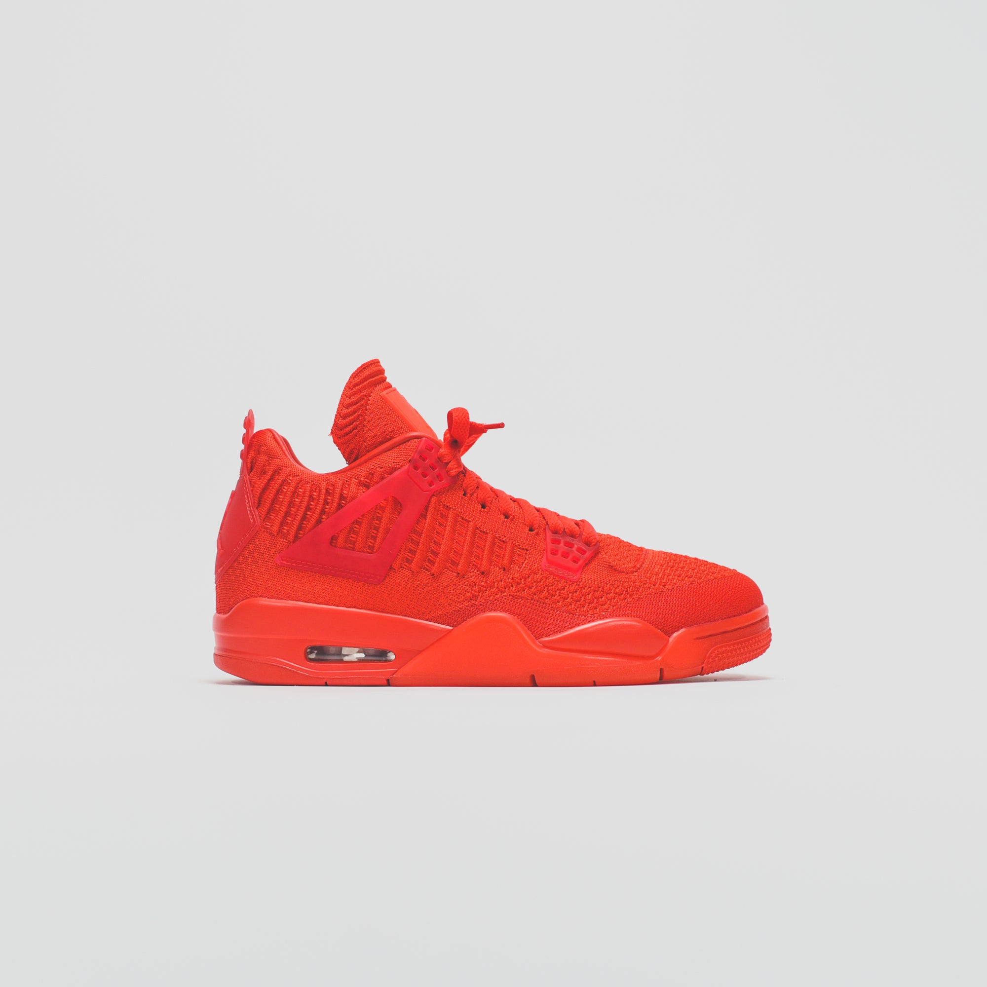 Nike Air Jordan 4 Retro Flyknit - University Red / Black – Kith