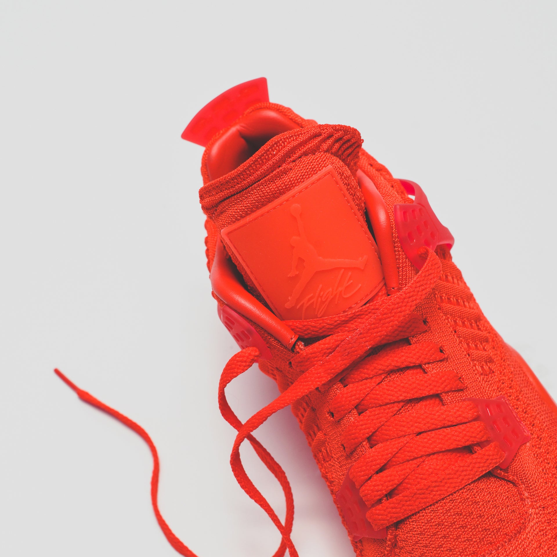 Nike Air Jordan 4 Retro Flyknit - University Red / Black