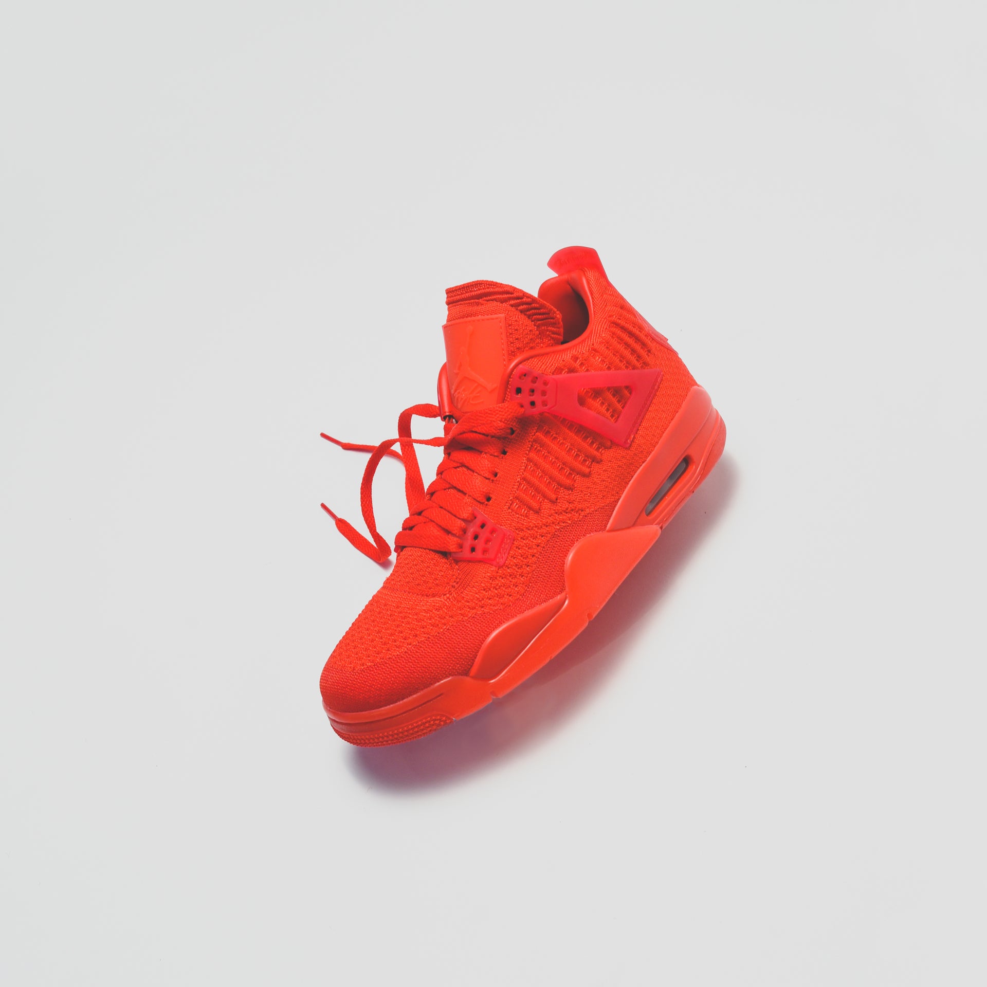 Nike Air Jordan 4 Retro Flyknit - University Red / Black