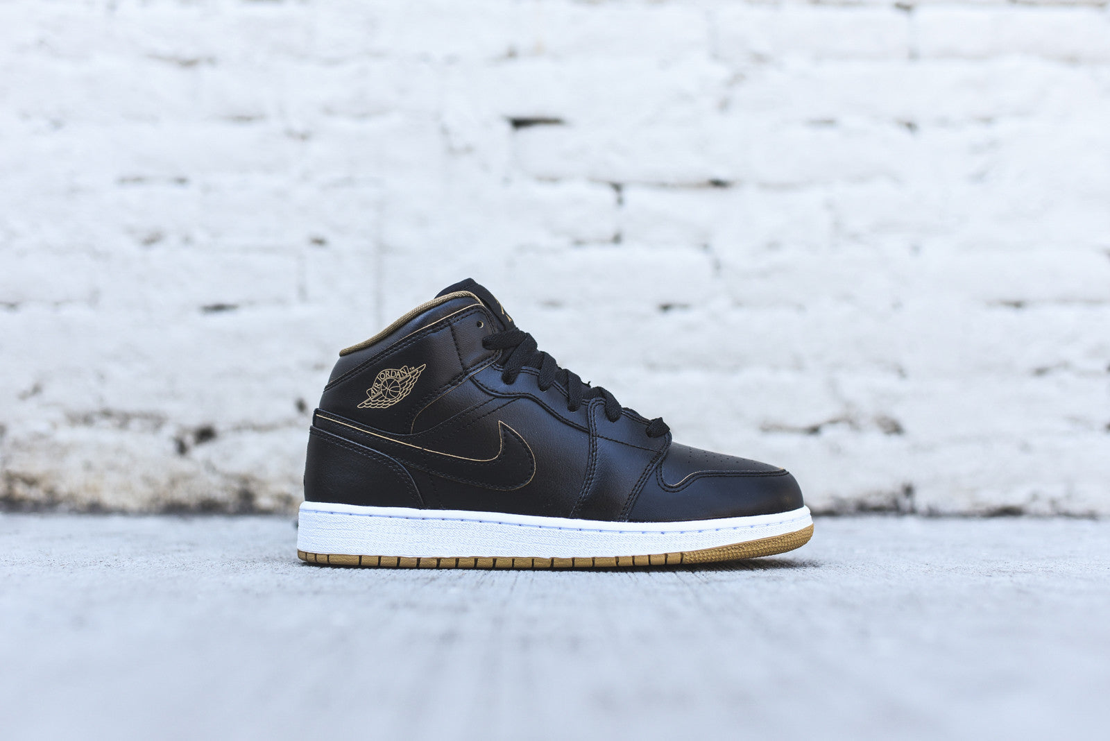 Nike Air Jordan 1 Mid GS - Black / Metallic Gold