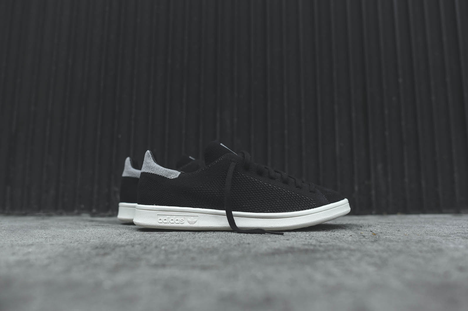 Adidas stan smith primeknit black on sale