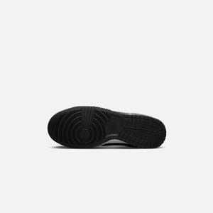 Nike inches Dunk Low Retro - Black / White