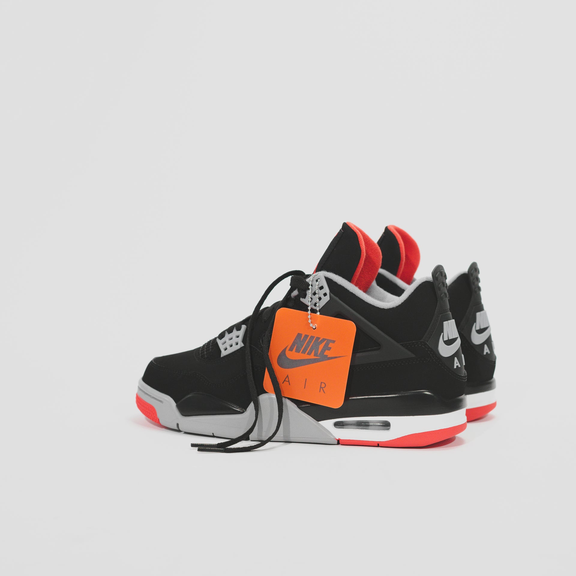 Nike Air Jordan 4 Retro - Black / Fire Red / Cement Grey