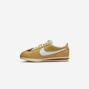 Brand new. Nike cortez. Black and rose gold. Size 3.
