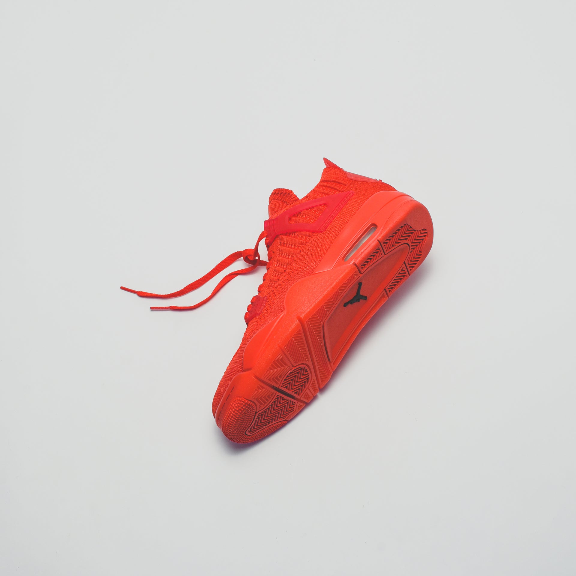 Nike Air Jordan 4 Retro Flyknit - University Red / Black