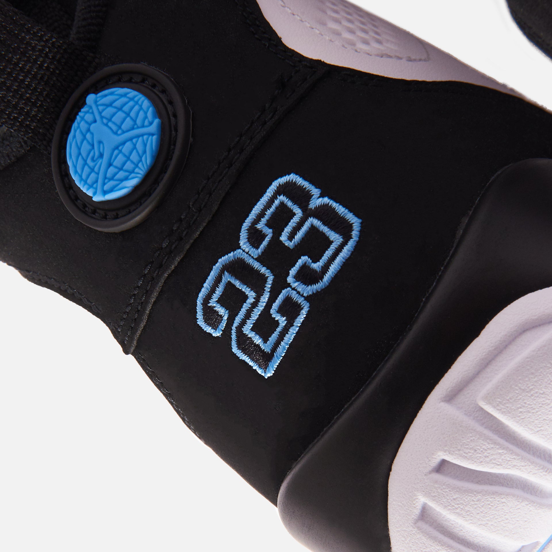 Nike Air Jordan 9 Retro - White / University Blue / Black