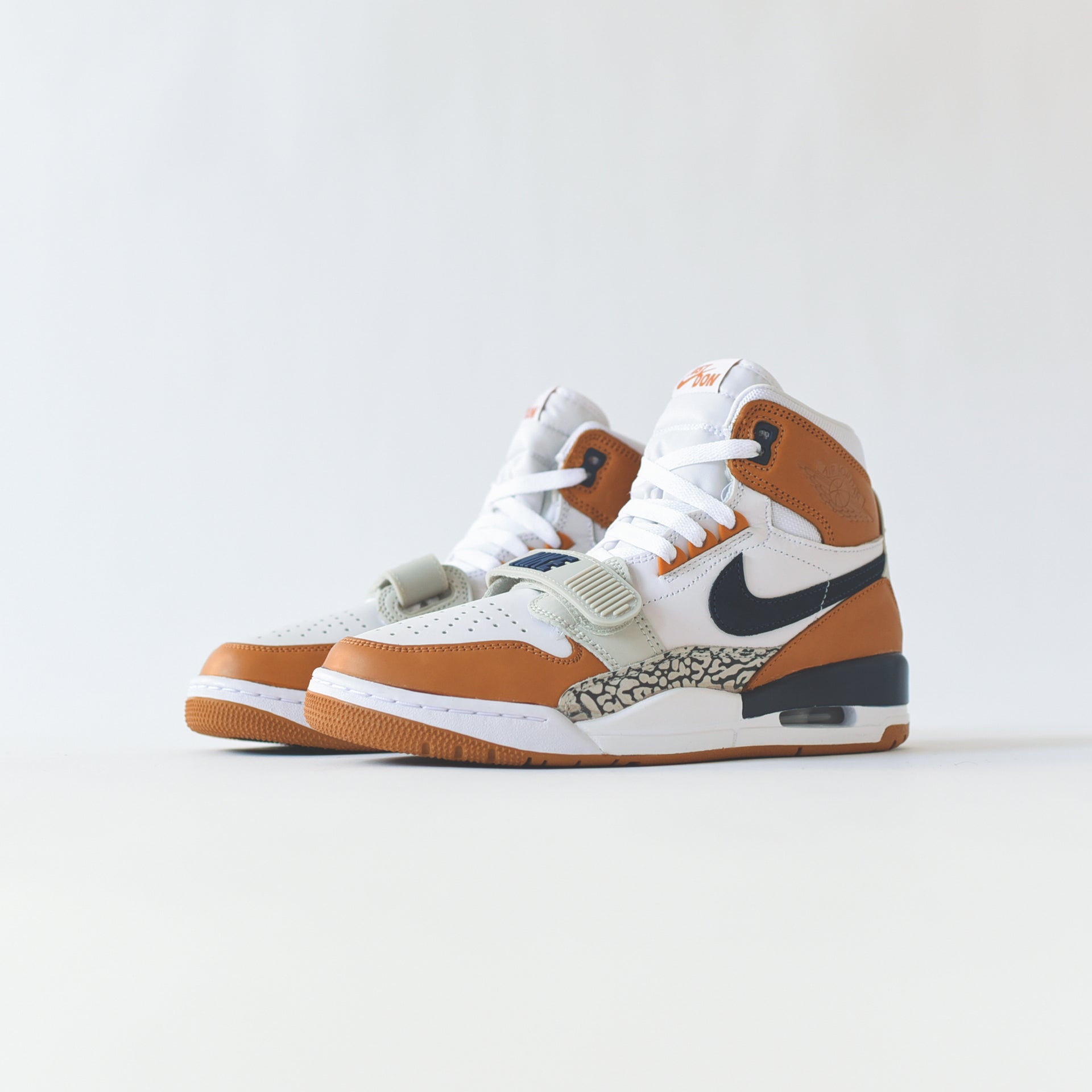 Nike Air Jordan Legacy 312 - White / Midnight Navy / Ginger