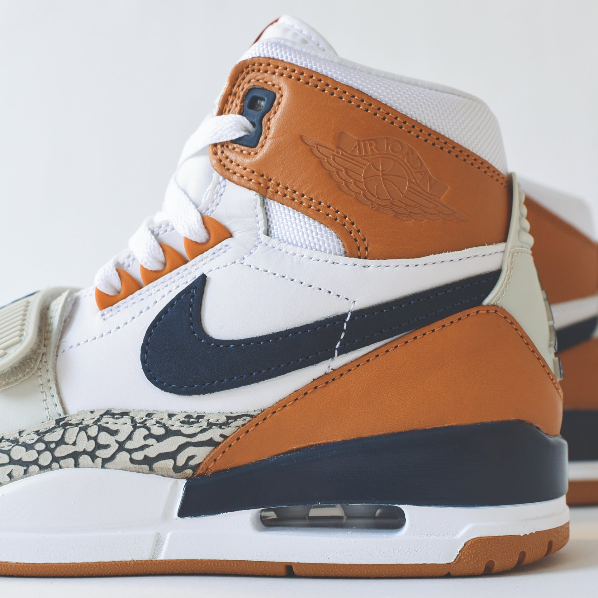 Nike Air Jordan Legacy 312 - White / Midnight Navy / Ginger