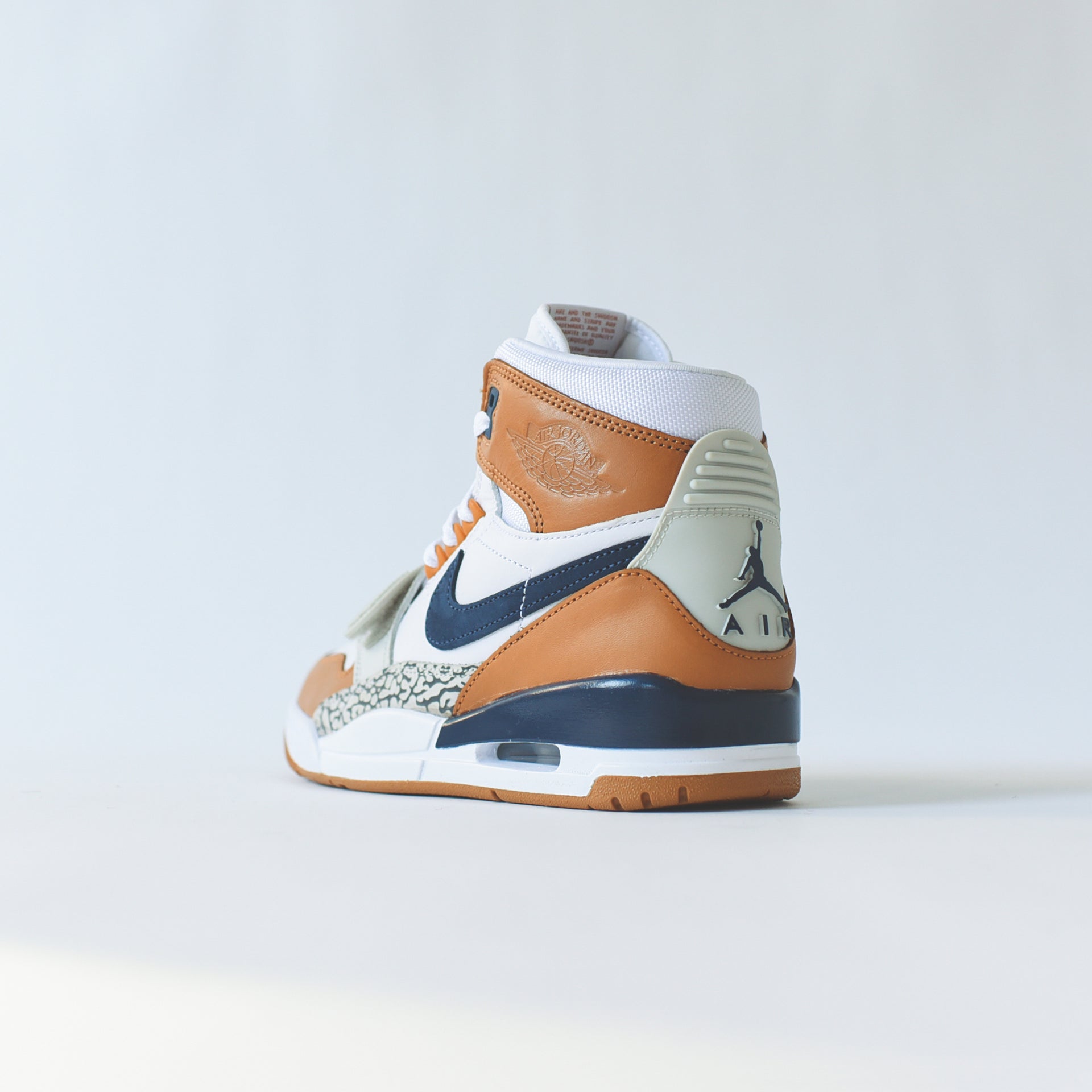 Nike Air Jordan Legacy 312 - White / Midnight Navy / Ginger