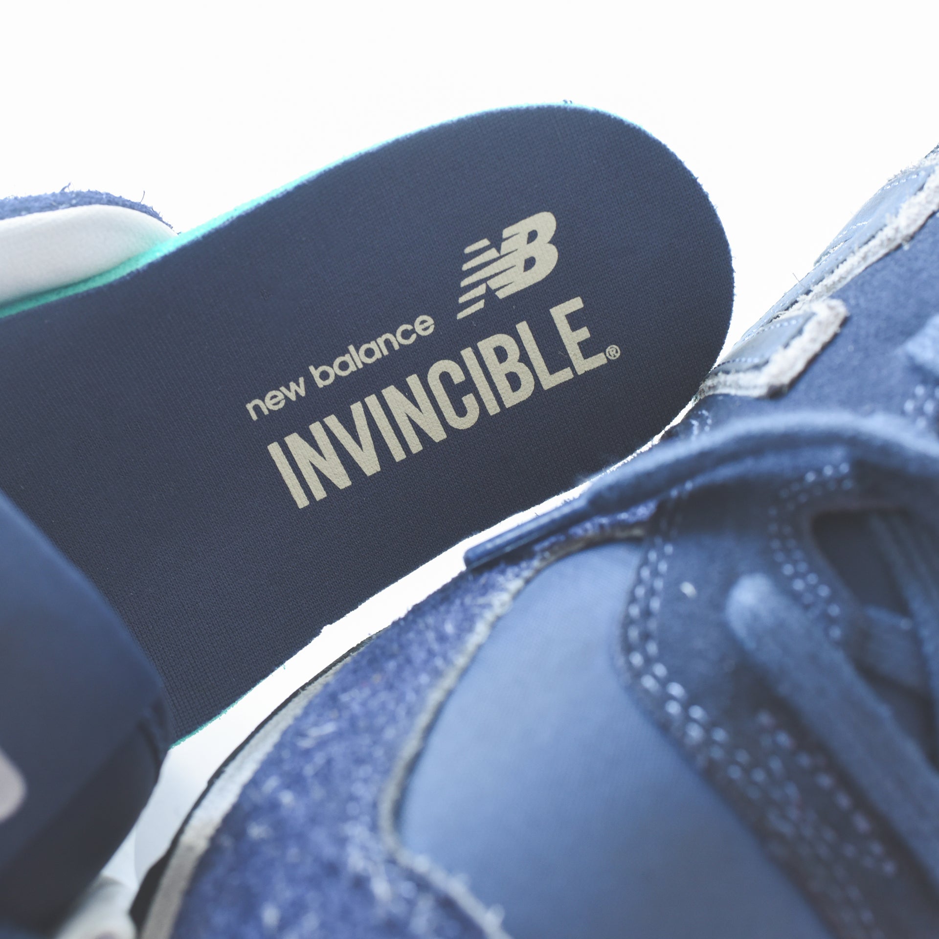 New Balance Invincible ML574 - Navy