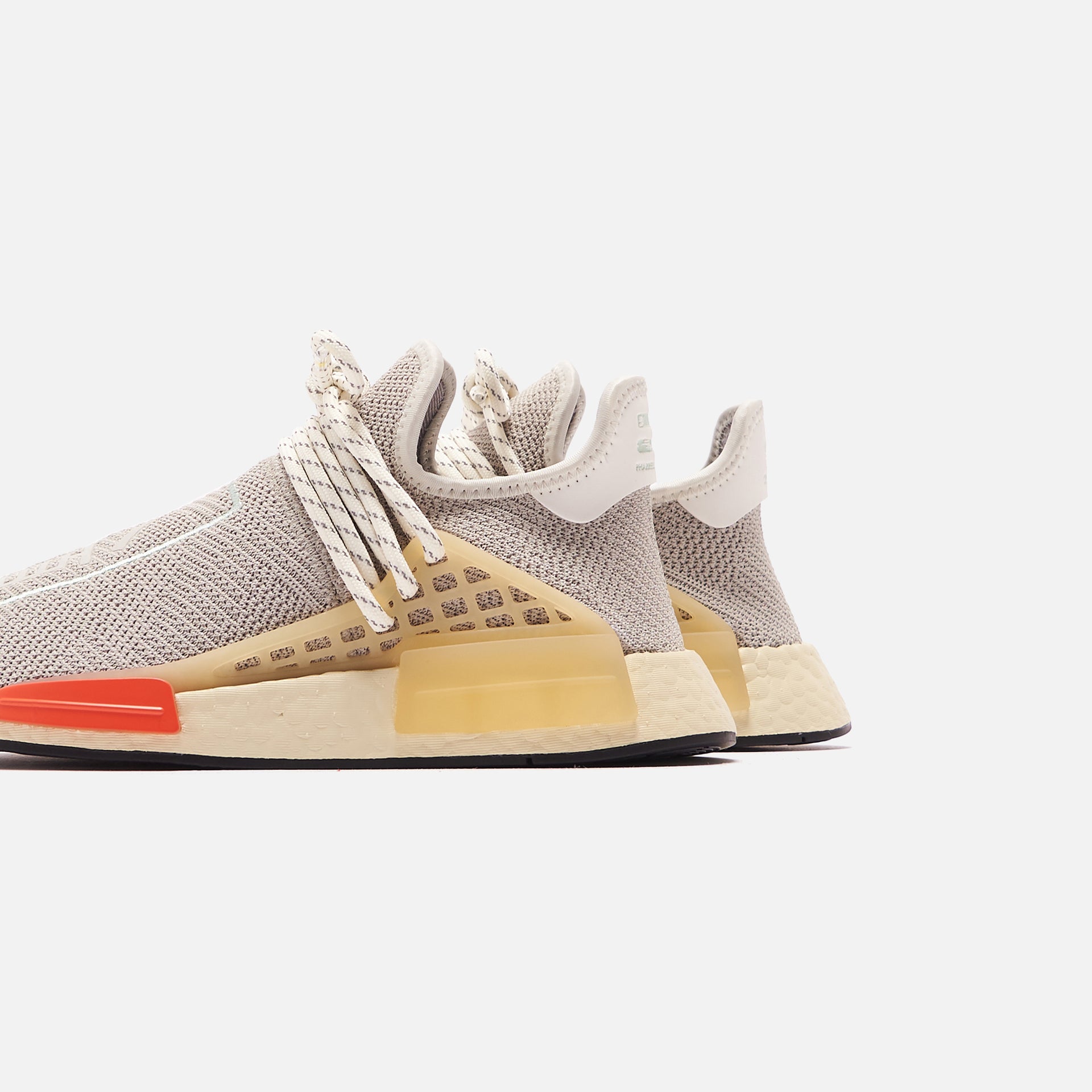 adidas x Pharrell NMD HU - Sesame / Sand / Bright Red
