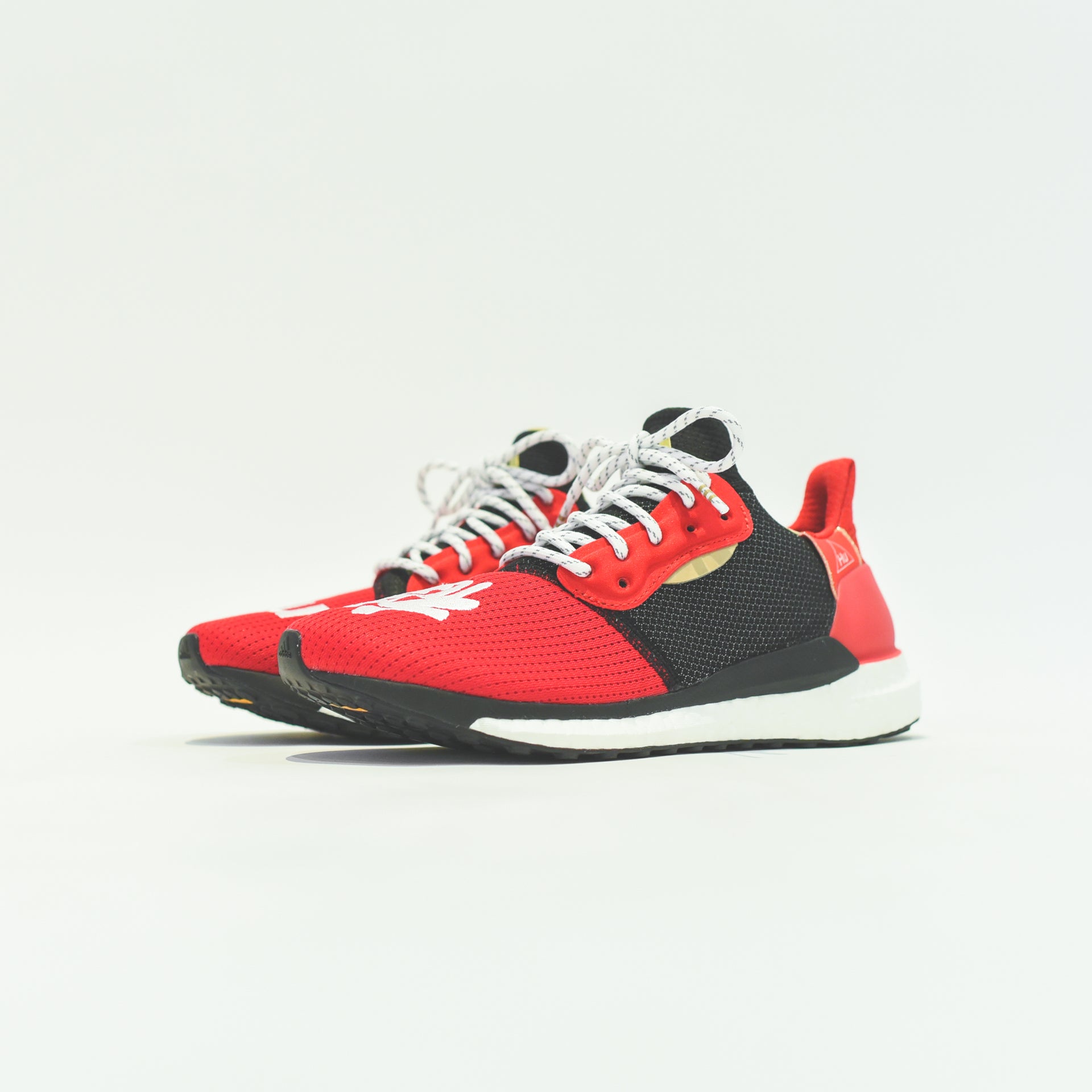 adidas x Pharrell Williams CNY Solar HU - Scarlet / White / Black / Met Gold