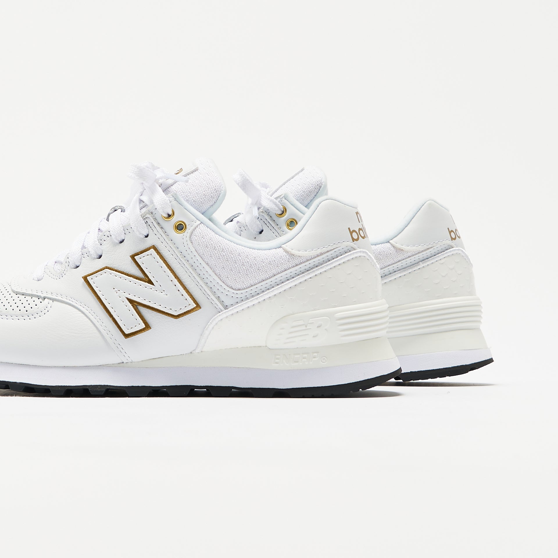 New Balance WMNS 574 - White / Metallic Gold